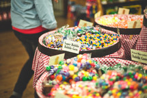 candy in barrels at a candy shop 