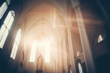 Interior of church with sunlight and lens flare filter effect