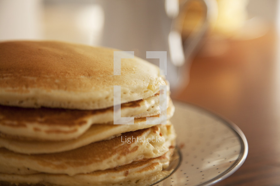 stack of pancakes on a plate 