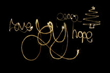 Christmas message written in lights.