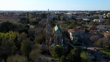 beautiful panoramic shot over a church surrounded by greenery Montpellier France