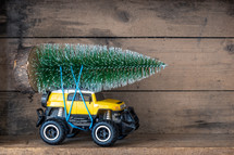 toy car with a bottle brush Christmas tree 