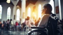 Side view of a disabled woman in a wheelchair in a church.