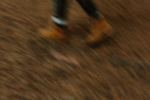 blurry hiking boots in motion 
