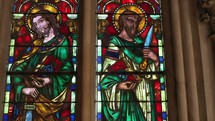 Sacred figures on church windows.
