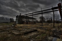 stormy sky over abandoned commercial warehouse 