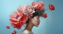 Fashion portrait of beautiful young woman with flowers in her hair.