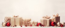 Christmas background with gift boxes and baubles. Copy space.