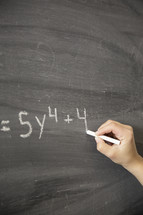 math equation on a chalkboard 