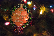 Vintage ornament hanging on a Christmas tree.