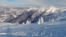 Fast motion in snowy winter mountains in alpine ski resort in cold frozen nature landscape
