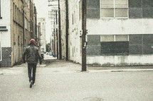 man, alley, leather jacket, hoodie, walking, standing