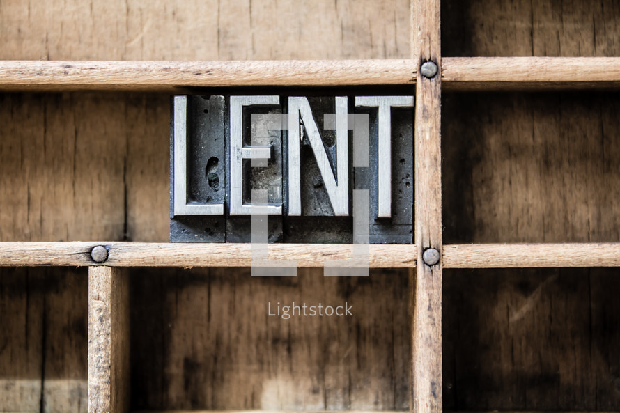 word lent on a bookshelf 