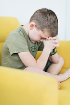child praying 