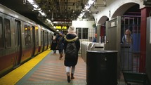 walking through a subway station 