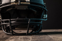 football helmet in a locker room 