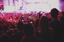 a large gathering of youth at a concert