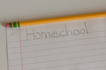 word homeschool on a piece of paper 