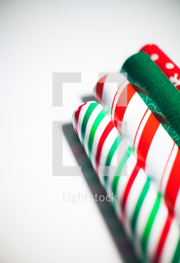 rolls of Christmas wrapping paper