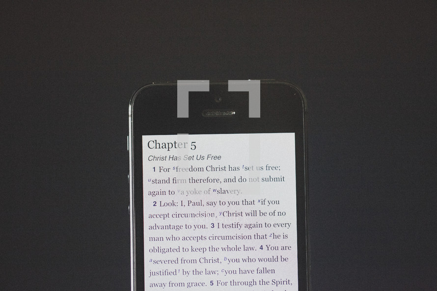 Sacred scripture on a smart phone.