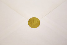 A shiny gold crown seal representing the King.