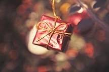 a red hanging gift ornament 
