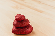stack of three red hearts 