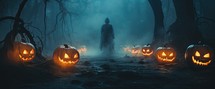 Scary halloween background with pumpkins and witch in the forest