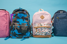 row of student book bags 