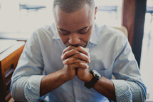 African-American man praying 