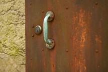 handle on a rusty door 