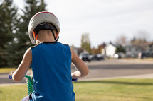 a child riding a bike 