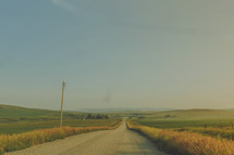 gravel road and rural landscape 