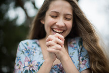 face of a woman in joyful prayer 