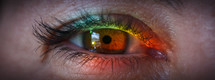 rainbow of colors in a woman's eye