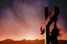 Jesus crucified at sunset