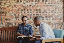 men reading Bibles at a Bible study 