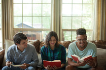 Young adults at a home Bible study.