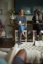 women attentively listening to a home Bible study 