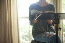 A woman leading a Bible study.