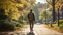  Student Walking on Autumn Campus