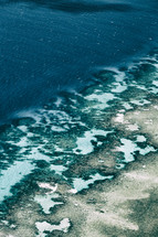aerial view over shallows seas 