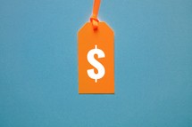 dollar symbol on the orange price tag