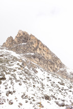 jagged mountain peak with snow 