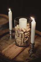 Unity candle set on top of wine corks