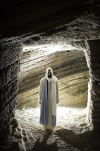 Jesus standing at the entrance of a tomb