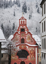 red church with bell tower 