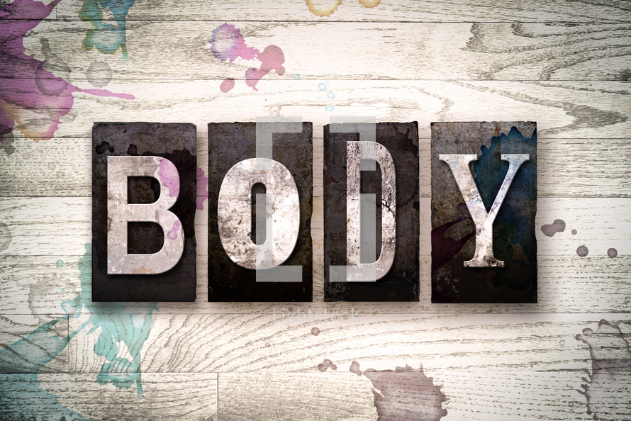 word body on wood background 