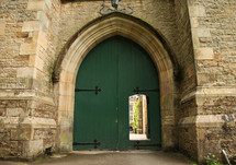 green arched doors 