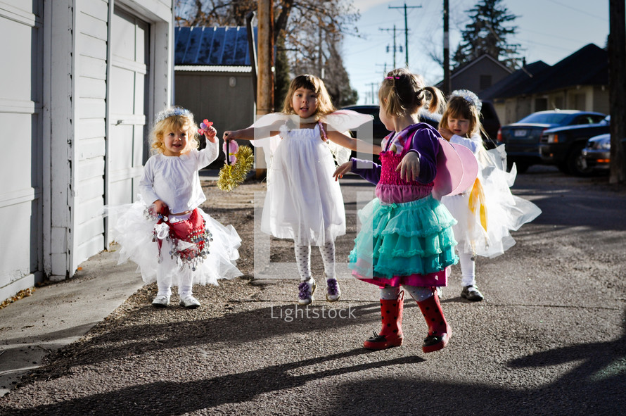 Children and toddlers dressed as angels for a Christmas pageant 